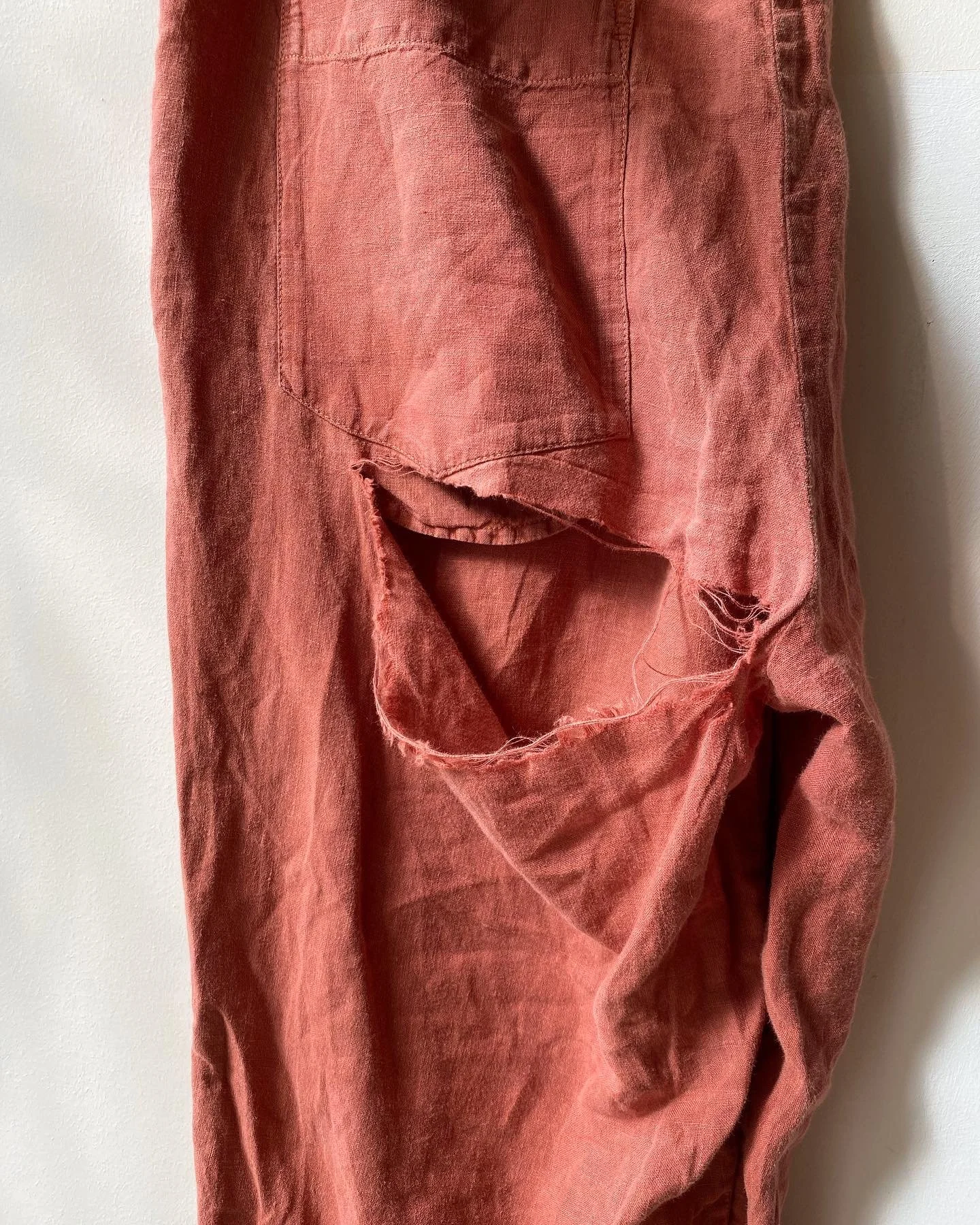 Large tear at seat of linen trousers