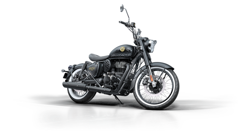 Black cruiser motorcycle with chrome details and a windshield, standing on a reflective surface.