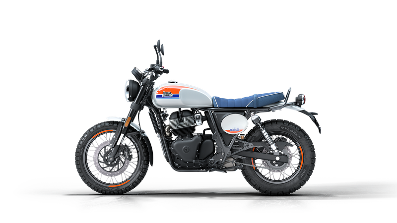 A vintage Royal Enfield motorcycle with a white fuel tank, blue and orange accents, and a black engine, set against a plain black background.