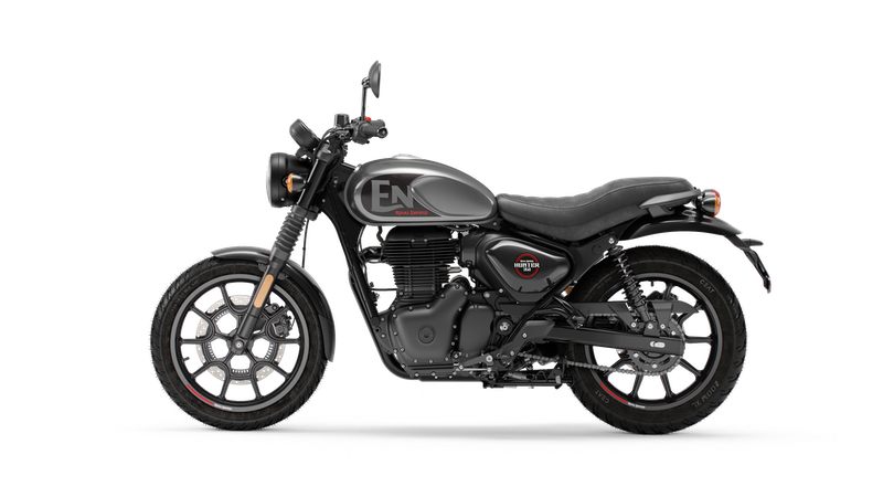 Black motorcycle with custom branding, including a matte black fuel tank and black wheels, photographed against a white background.