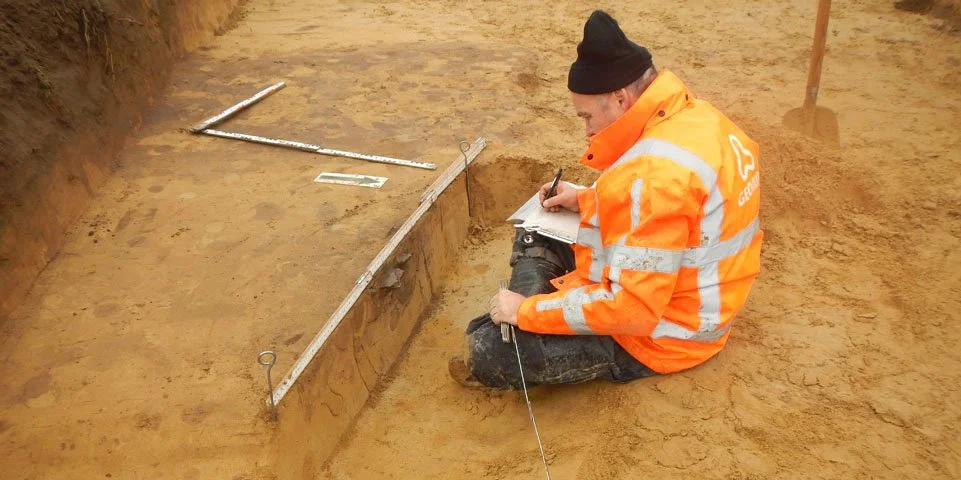Archeologische vondst in vorm logo Geonius