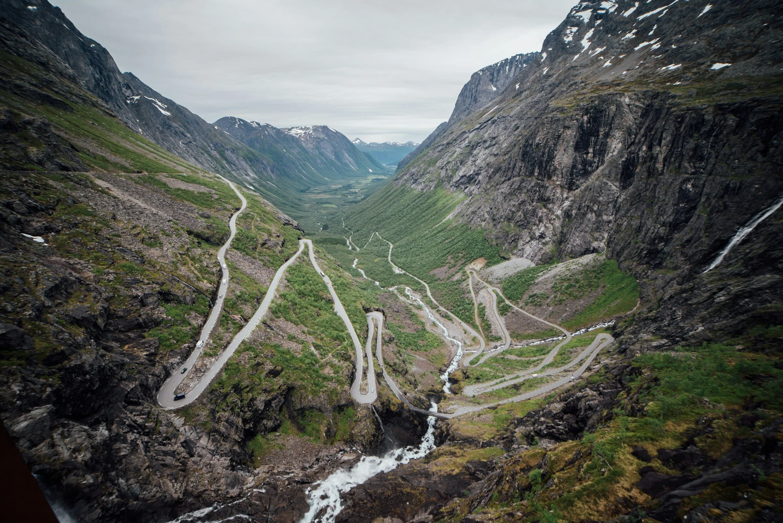 Hairpin turns on a Norwegian mountain pass road, showing the terrain of a self-drive route on Trollstigen