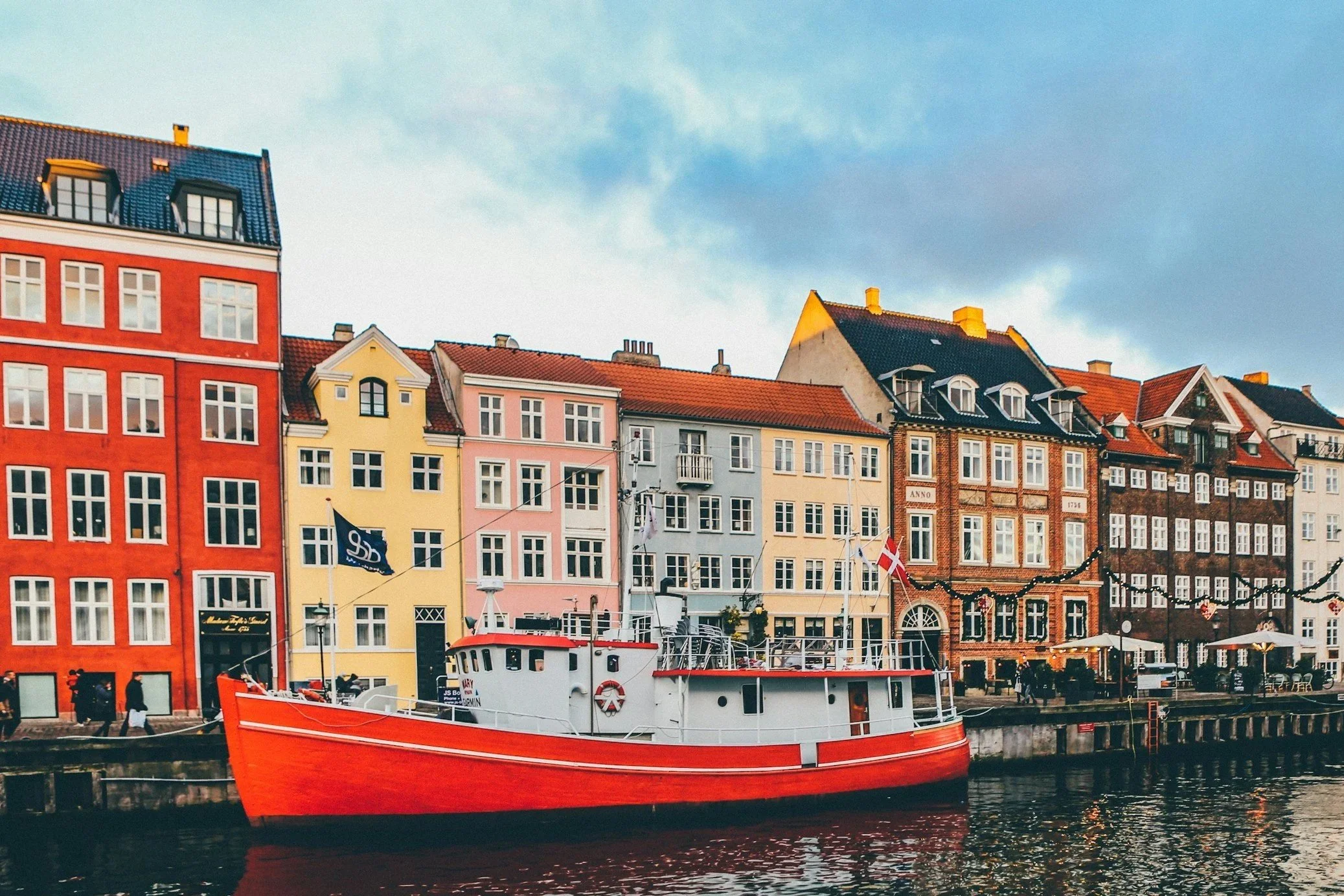 Colorful Nyhavn waterfront in Copenhagen, a classic setting for Nordic city travel and design-led journeys