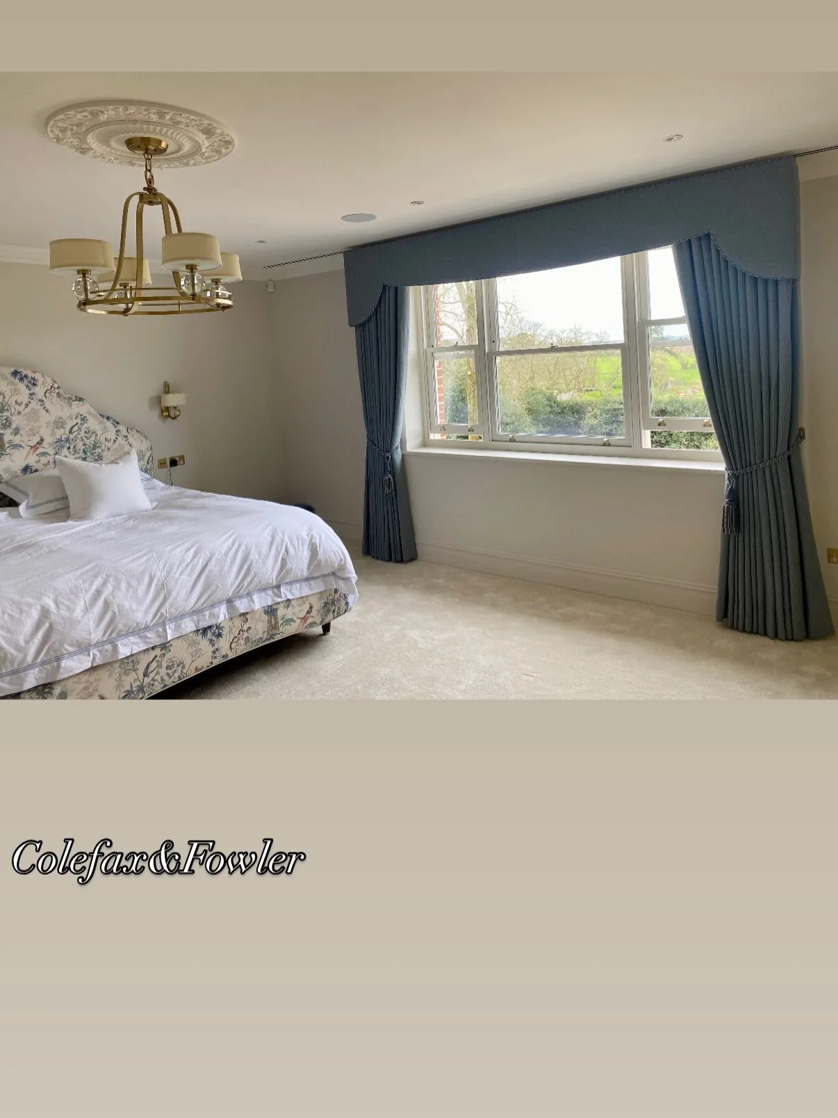 Elegant bedroom, pelmet and curtains, trimming and tie backs all in Colefax.