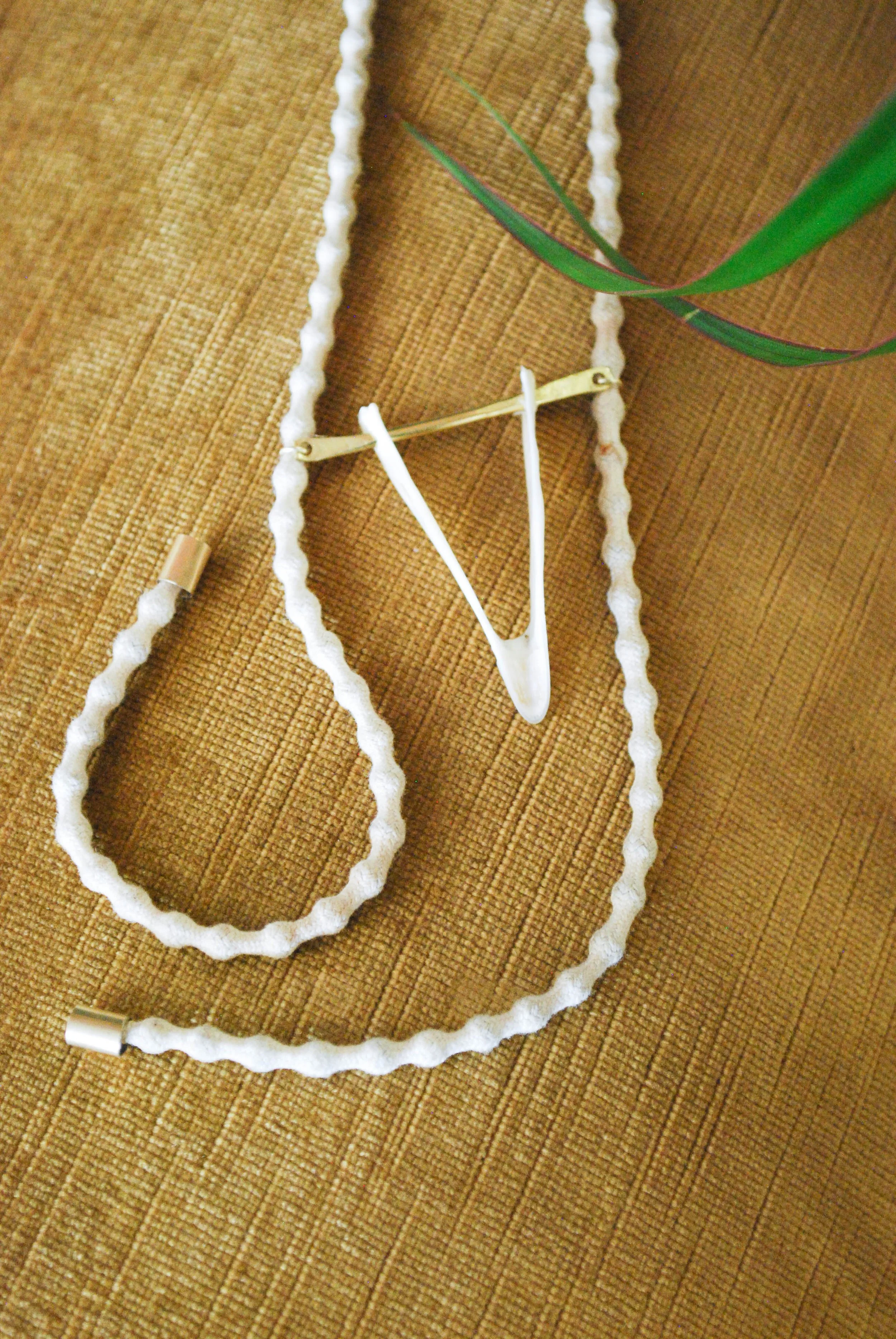 Curtain pull with chicken jaw and brass, 2019 