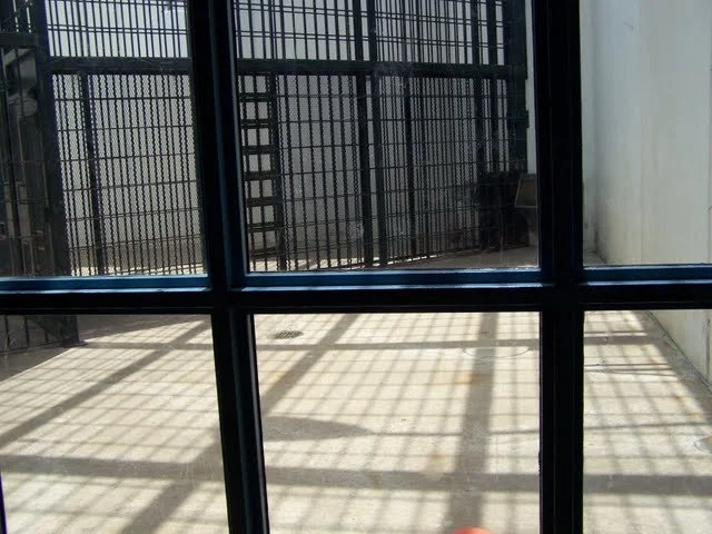 There are two concrete areas with a basketball net each side. In the distance you can see the urinal and water fountain that rarely works. Oh and it smells like one of those portable bathrooms outside - you know that smell?