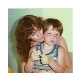 Randy, with his biological mother on his adoption day.