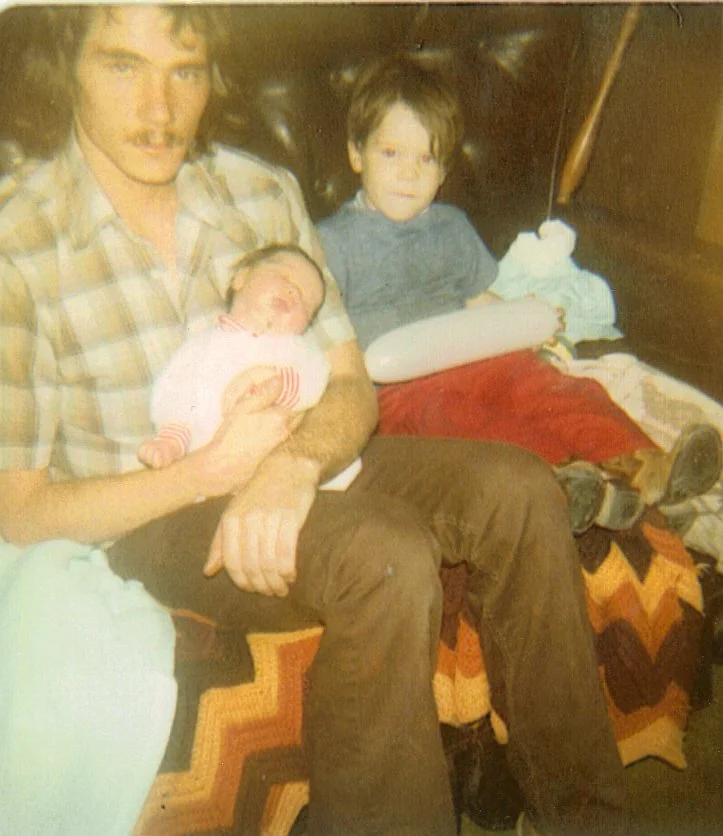 Randy, and Wesley as a baby, with their biological father.