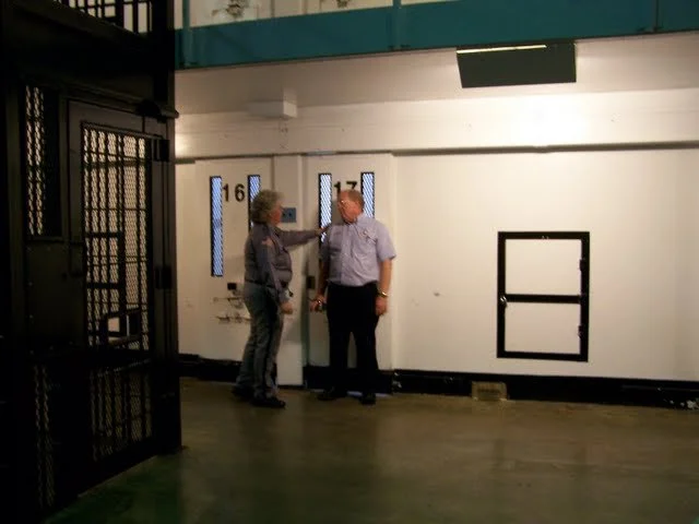 Downstairs view of 16/17 cell. To the left is the gate to the day room where we recreate inside. The day room is right in front of a few cells so it is easy to talk to one another. There's never any physical contact with anyone, but at least you can 