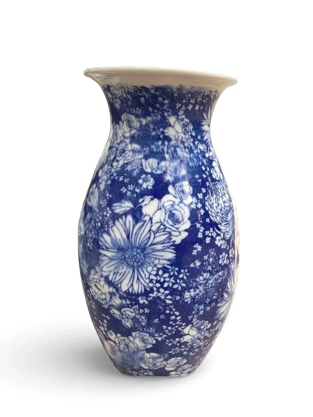 Blue and white floral-patterned ceramic vase with a flared top and rounded body.
