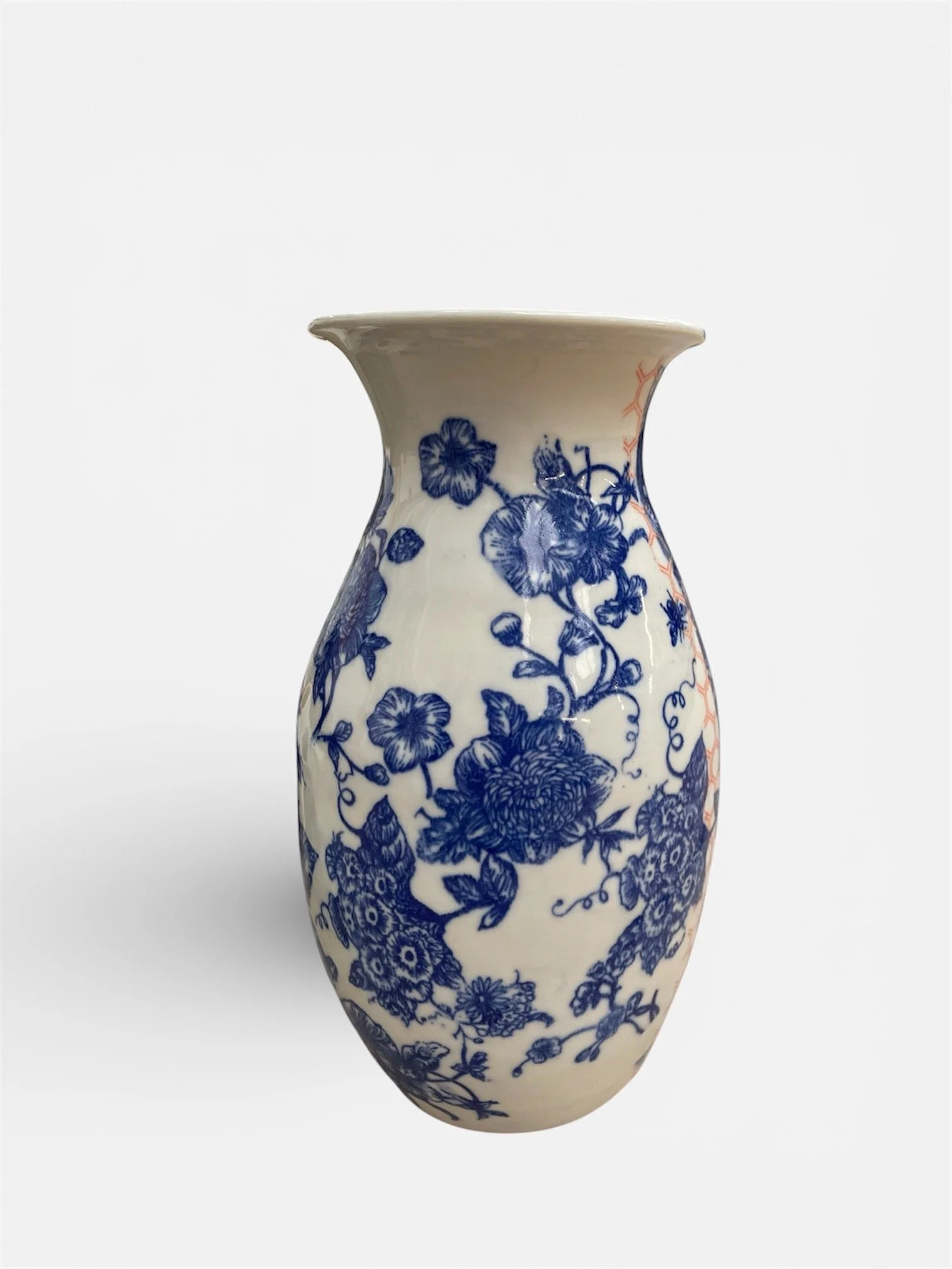 A white ceramic vase with blue floral patterns.