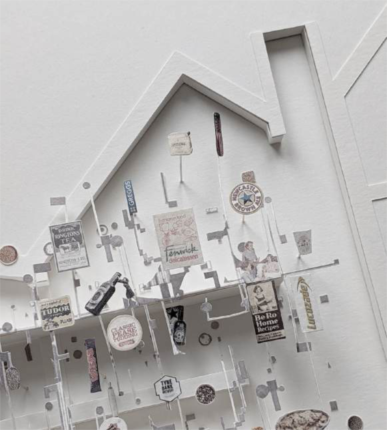 Concept model showcasing the interior activities within a pitched roof building