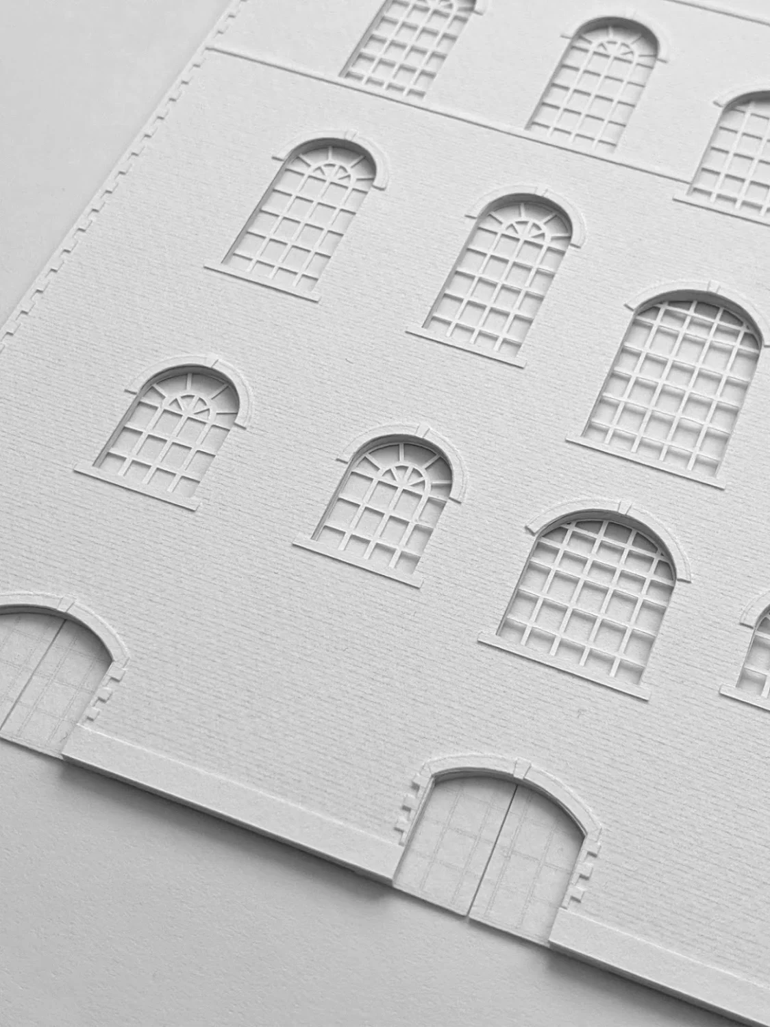 Elevation model with intricate arched windows and doors and subtle brick texture