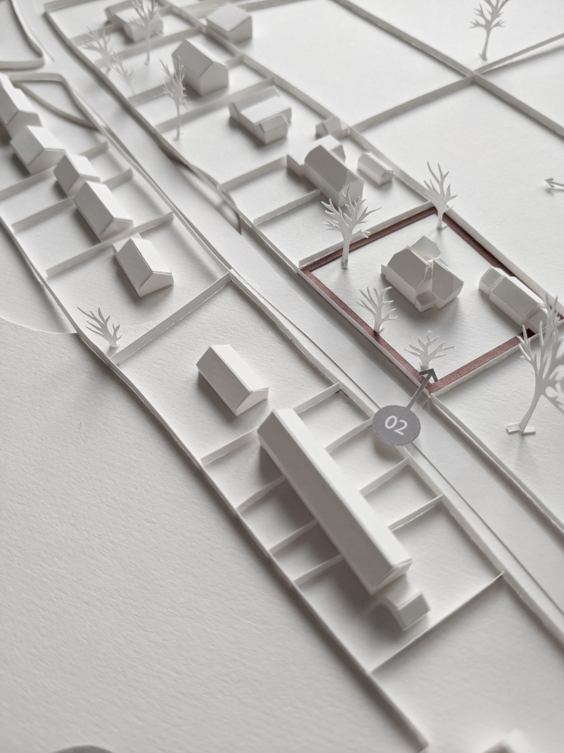 White paper large scale site model of part of a rural village