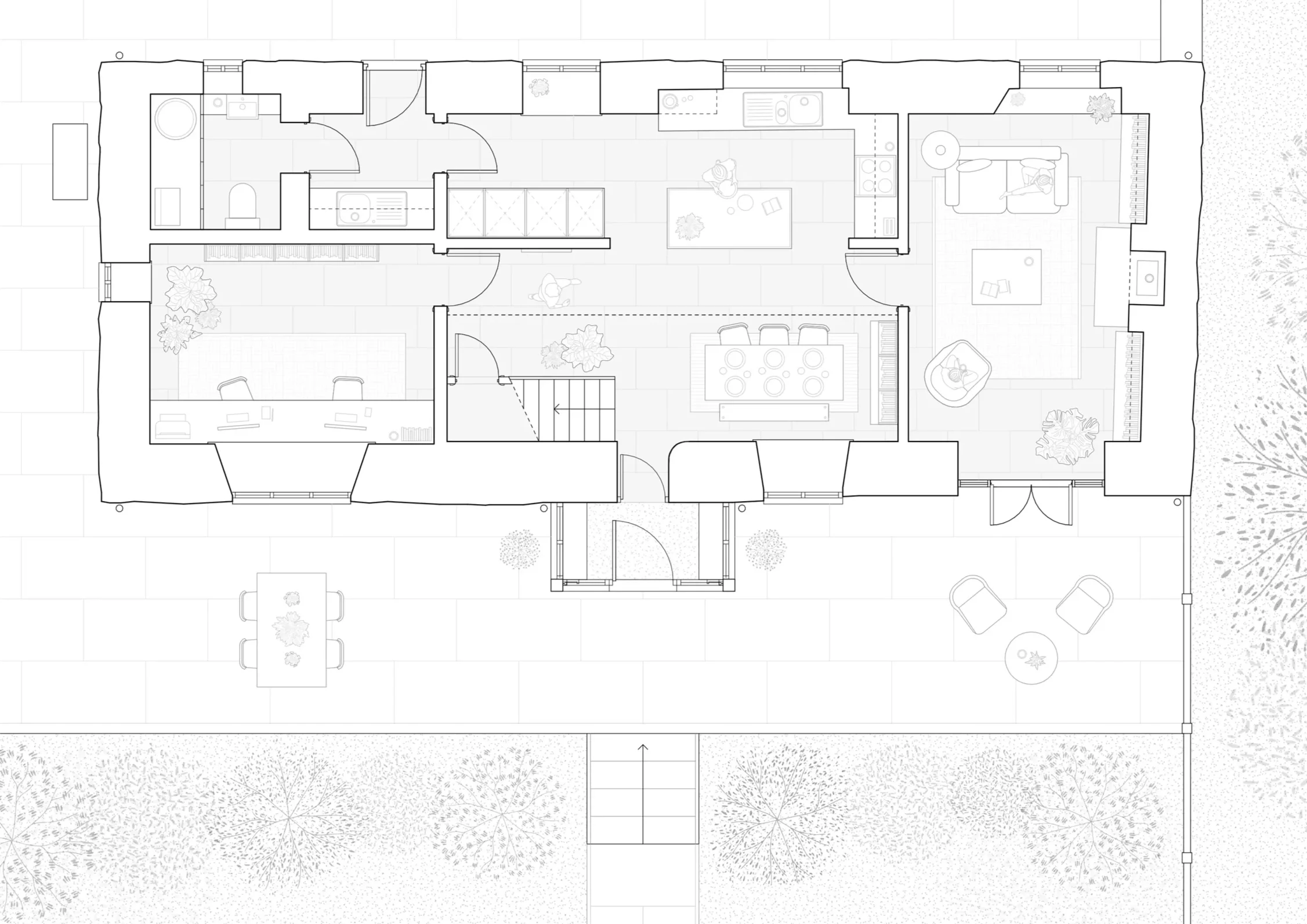 Black and white ground floor plan of a converted barn with outdoor terrace