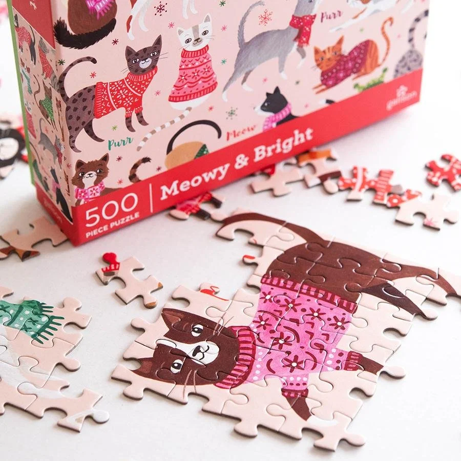 Closeup image of a partially completed holiday cat puzzle