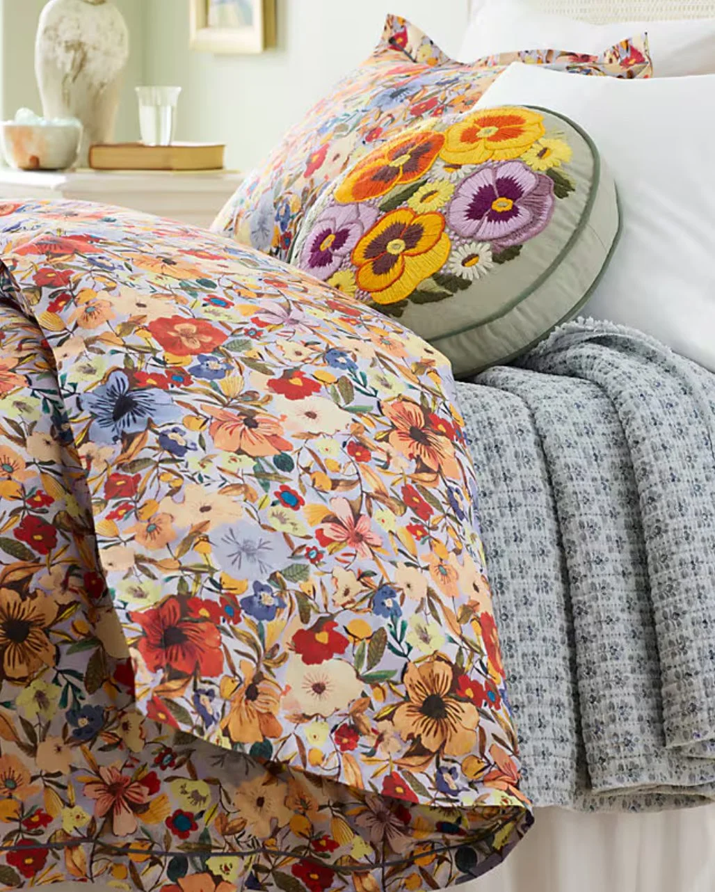 Floral bedding and round pillow