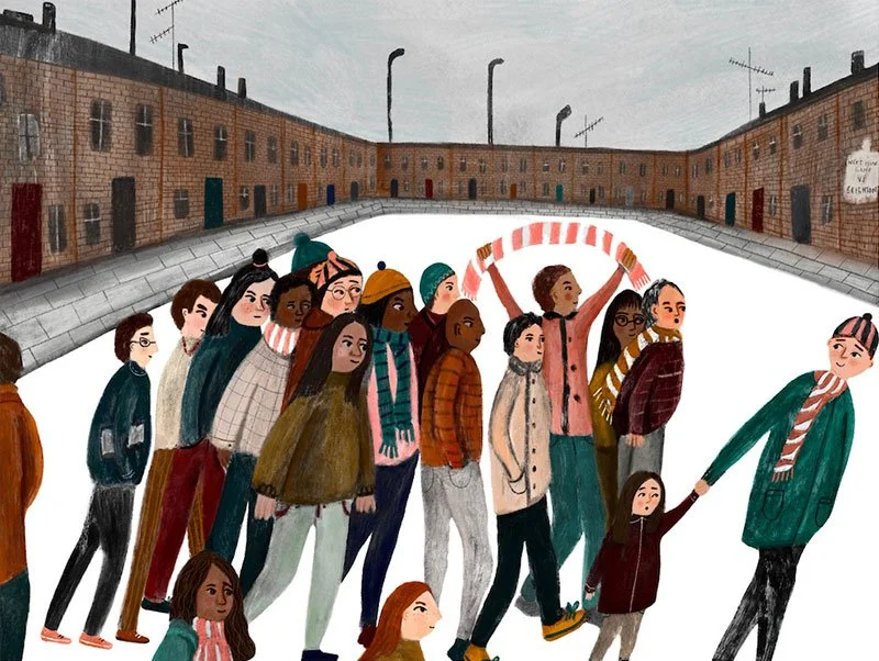 group of people heading to a football pitch