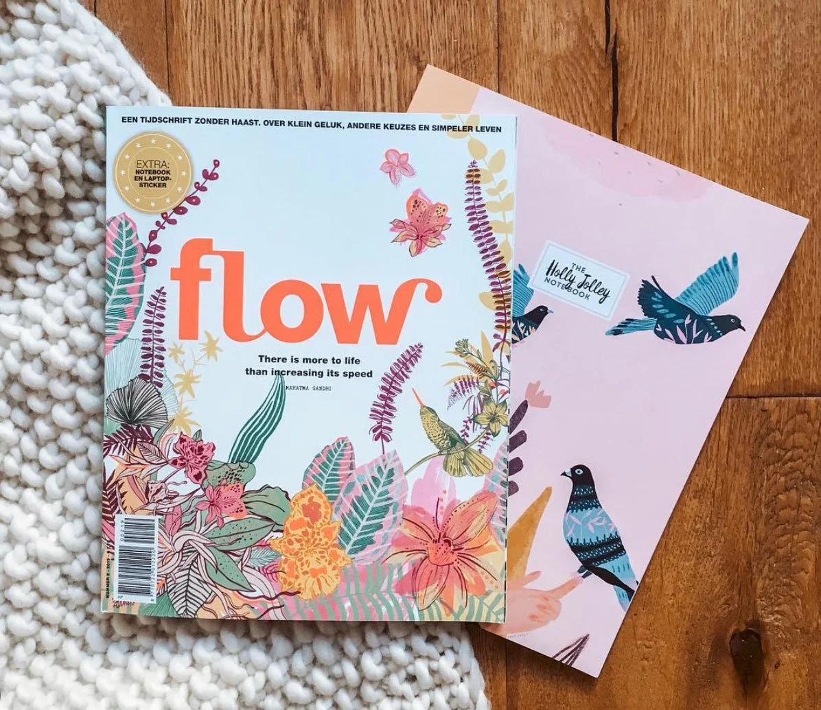 flow magazine cover sitting on a wood background