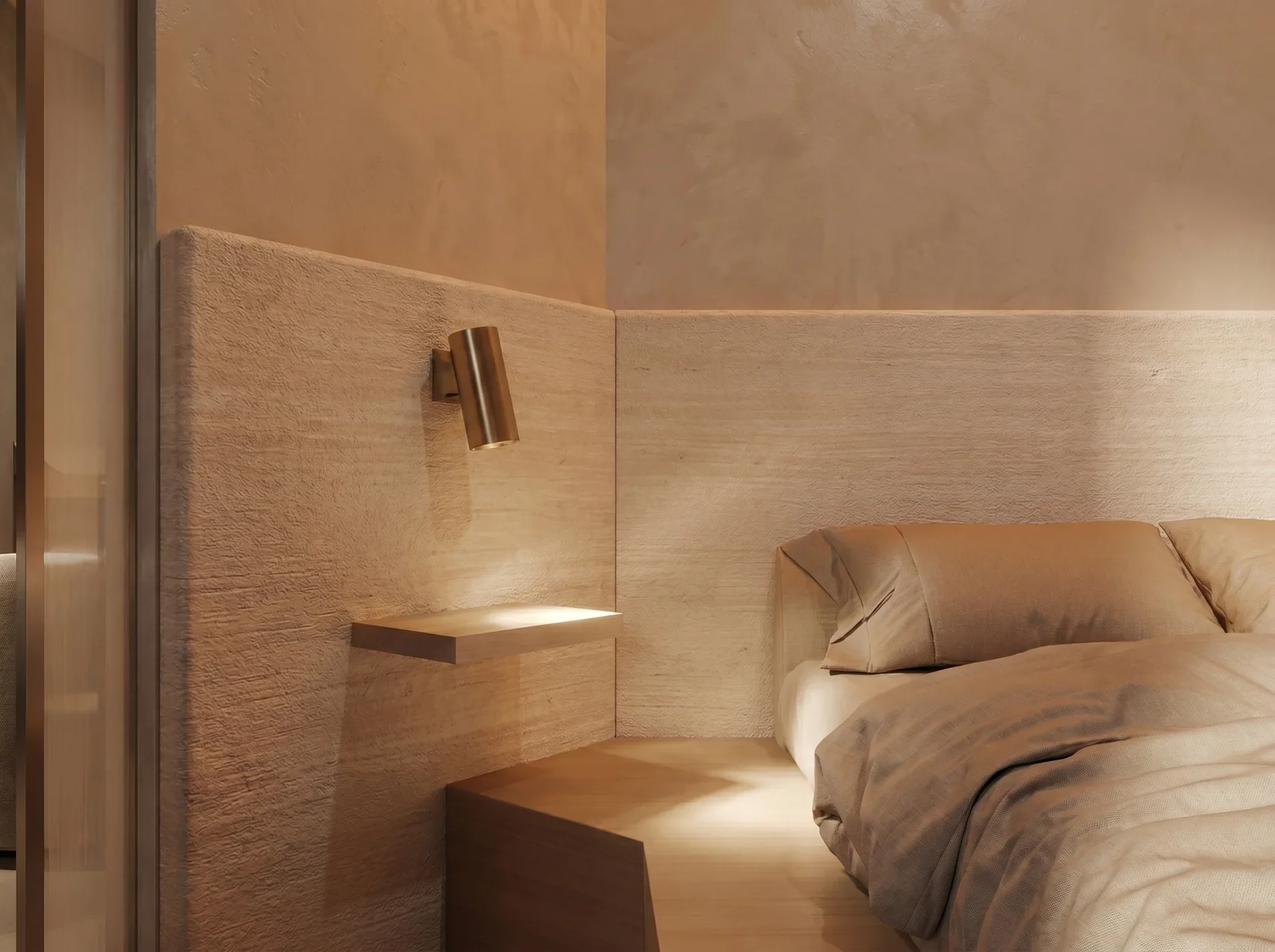 A modern bedroom with a wooden headboard, wall-mounted reading light, small floating side table, a beige bed with pillows, and textured beige walls.