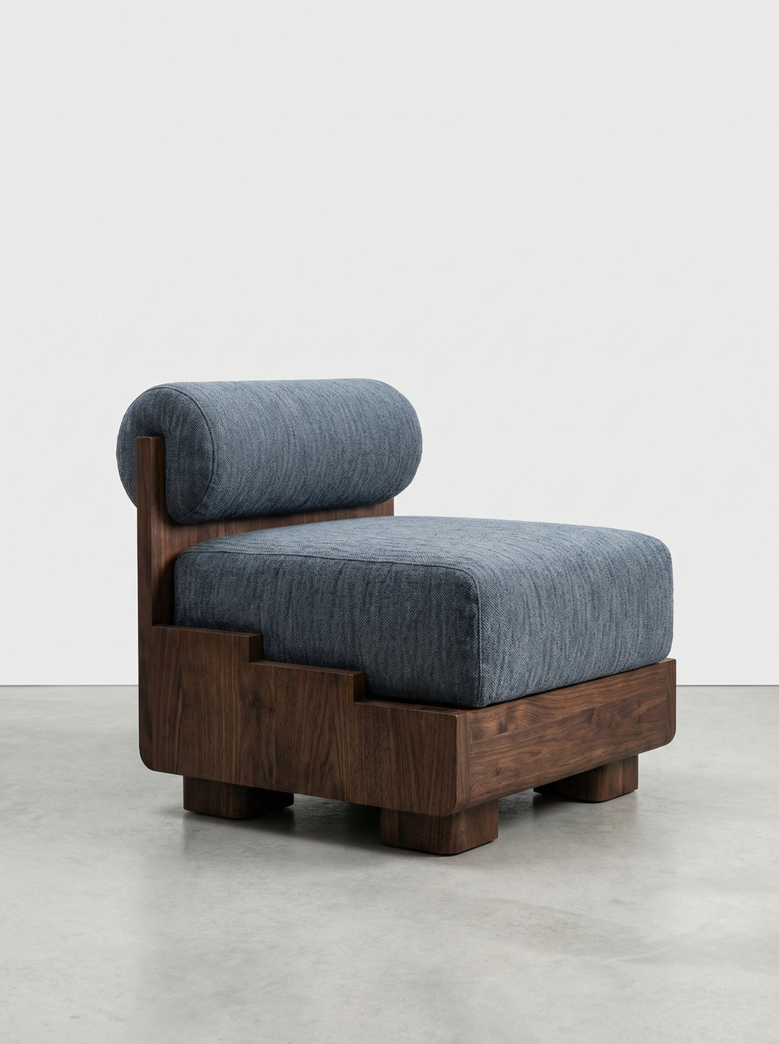 A modern chair with a wooden frame and blue upholstered cushions on the backrest and seat against a plain white background.