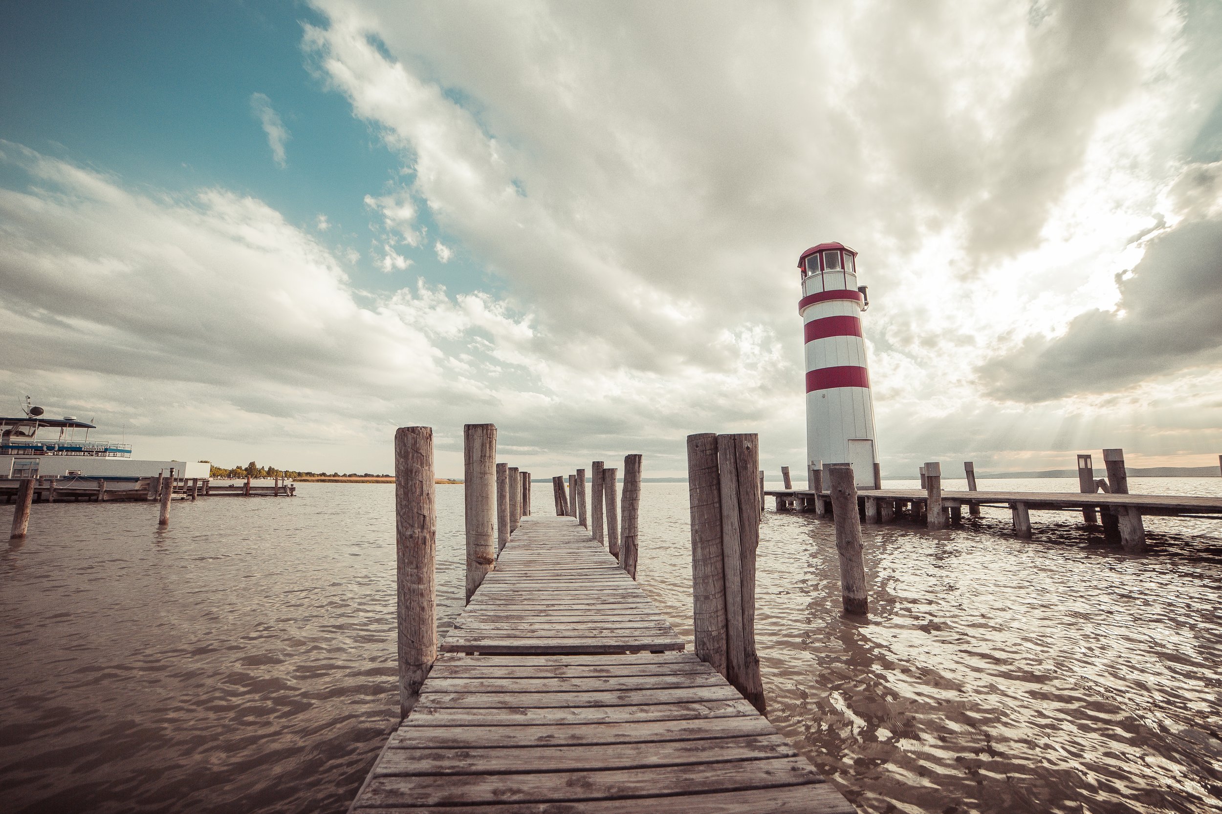pier-with-a-lighthouse-vintage-edit-picjumbo-com.jpg