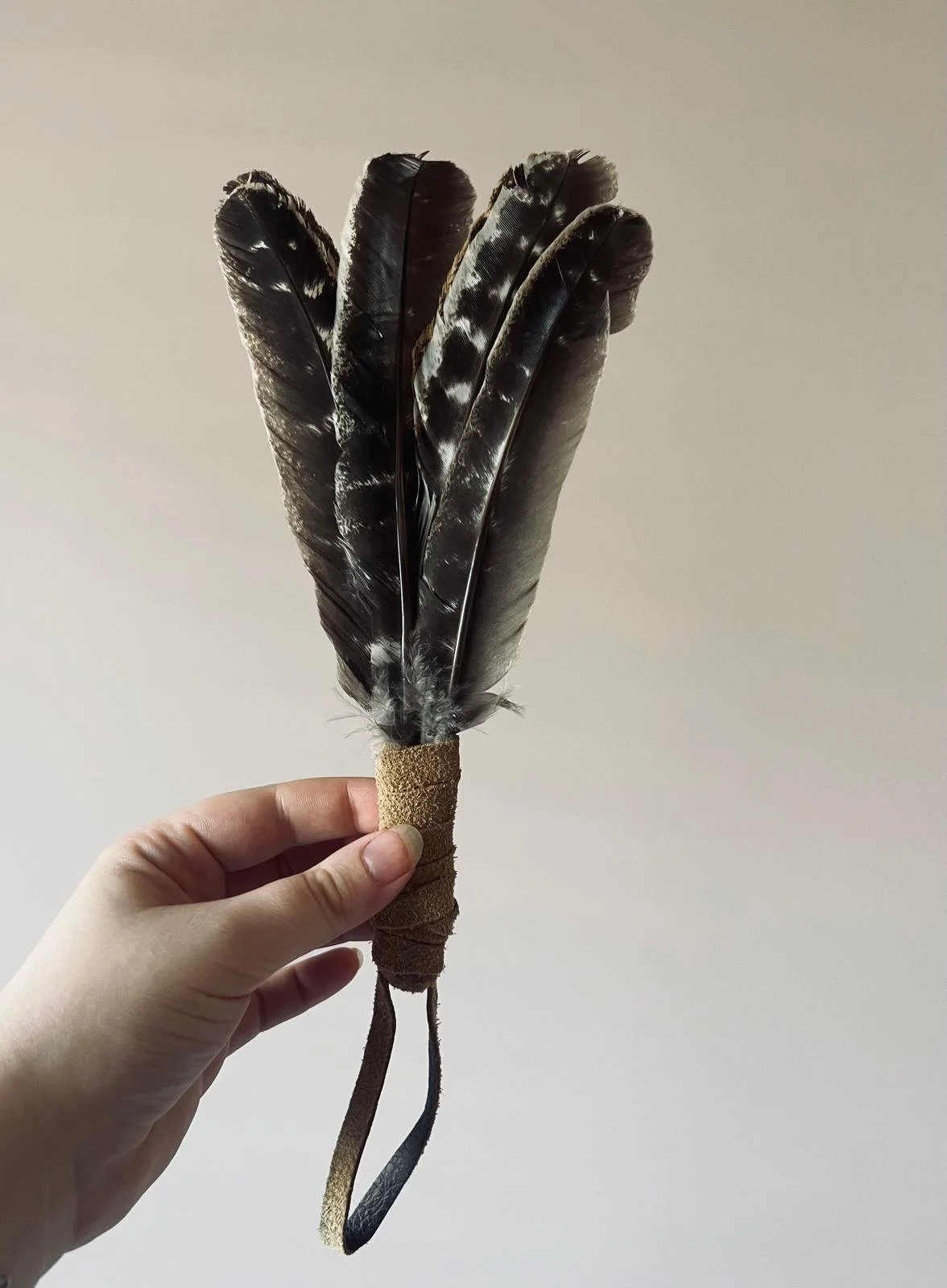Leather-bound fan