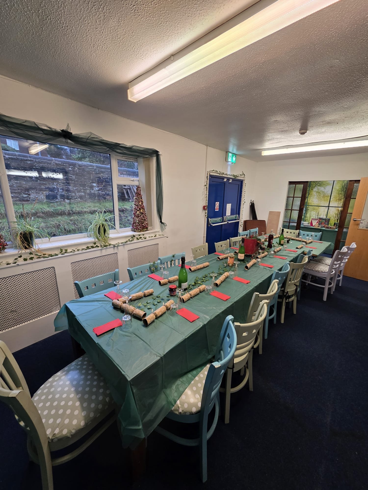 Meeting room set up for a Christmas lunch at Kirkstall Valley Development Trust.