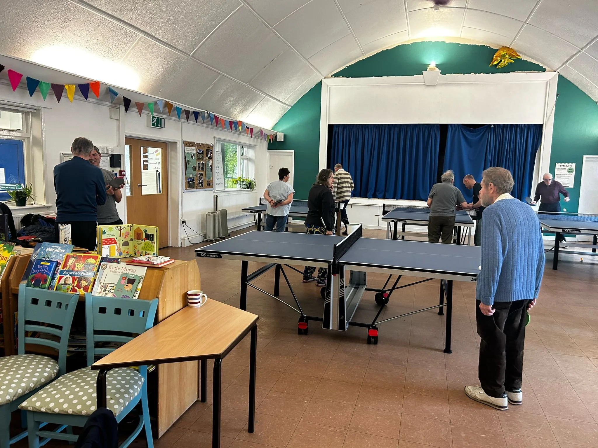Ping pong group session at the Kirkstall Valley Development Trust hub.