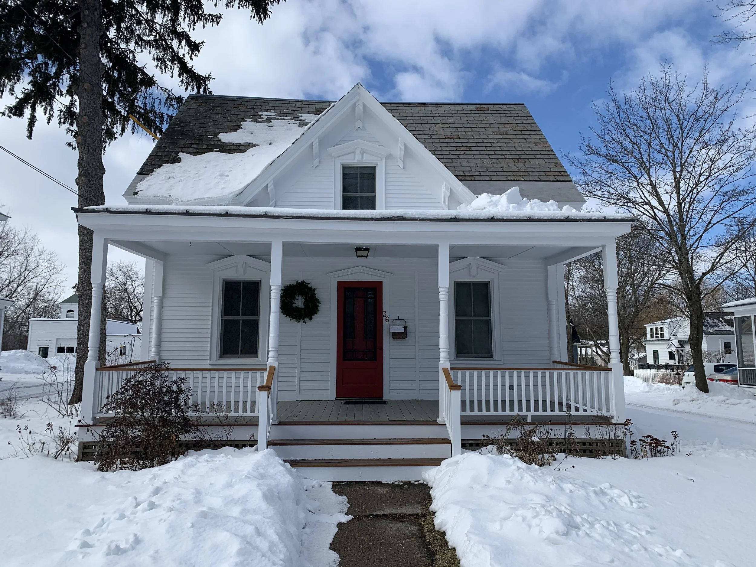 1.5 story Cape with snow