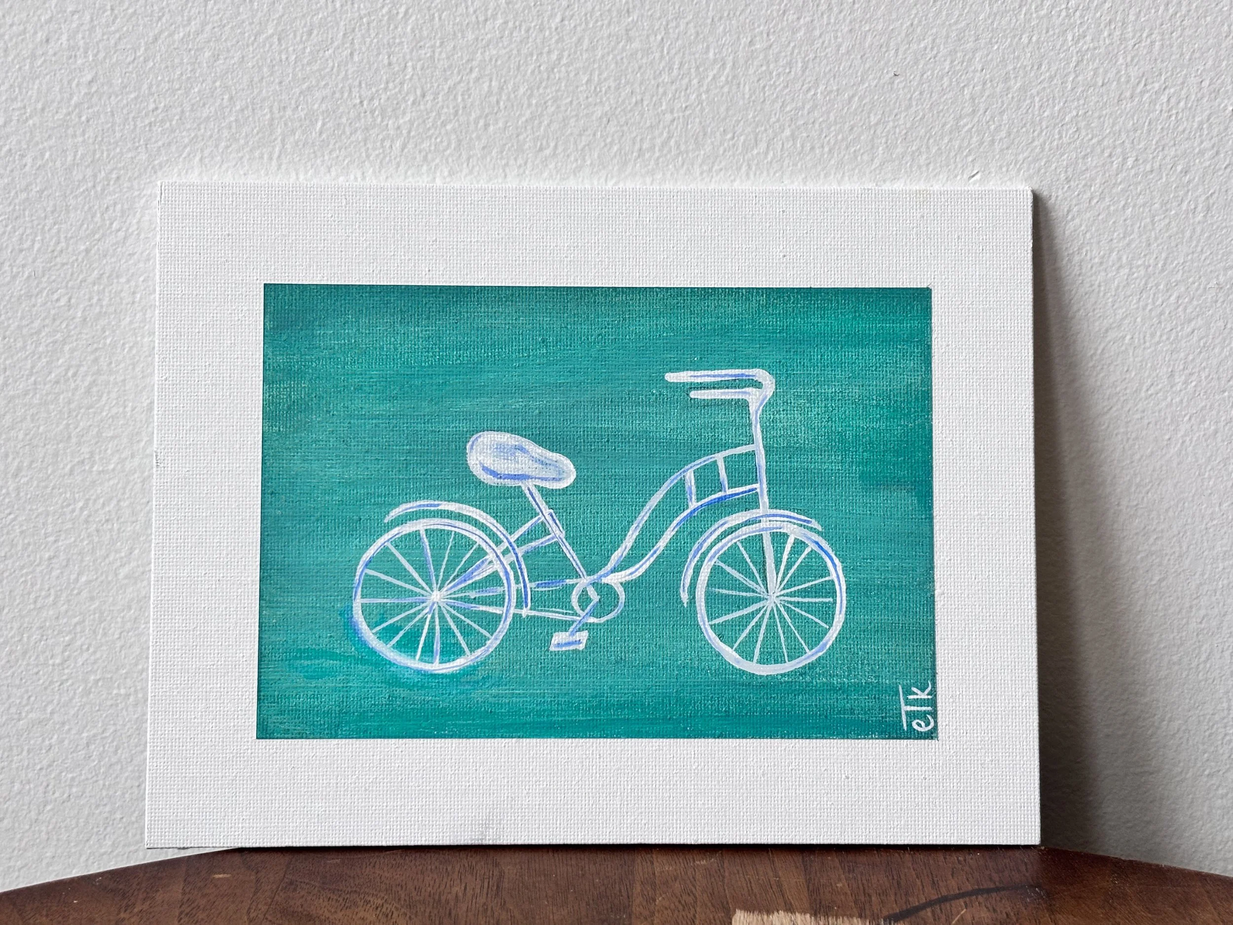 A painting of a blue bicycle on a turquoise background, signed 'elK' in the bottom right corner.