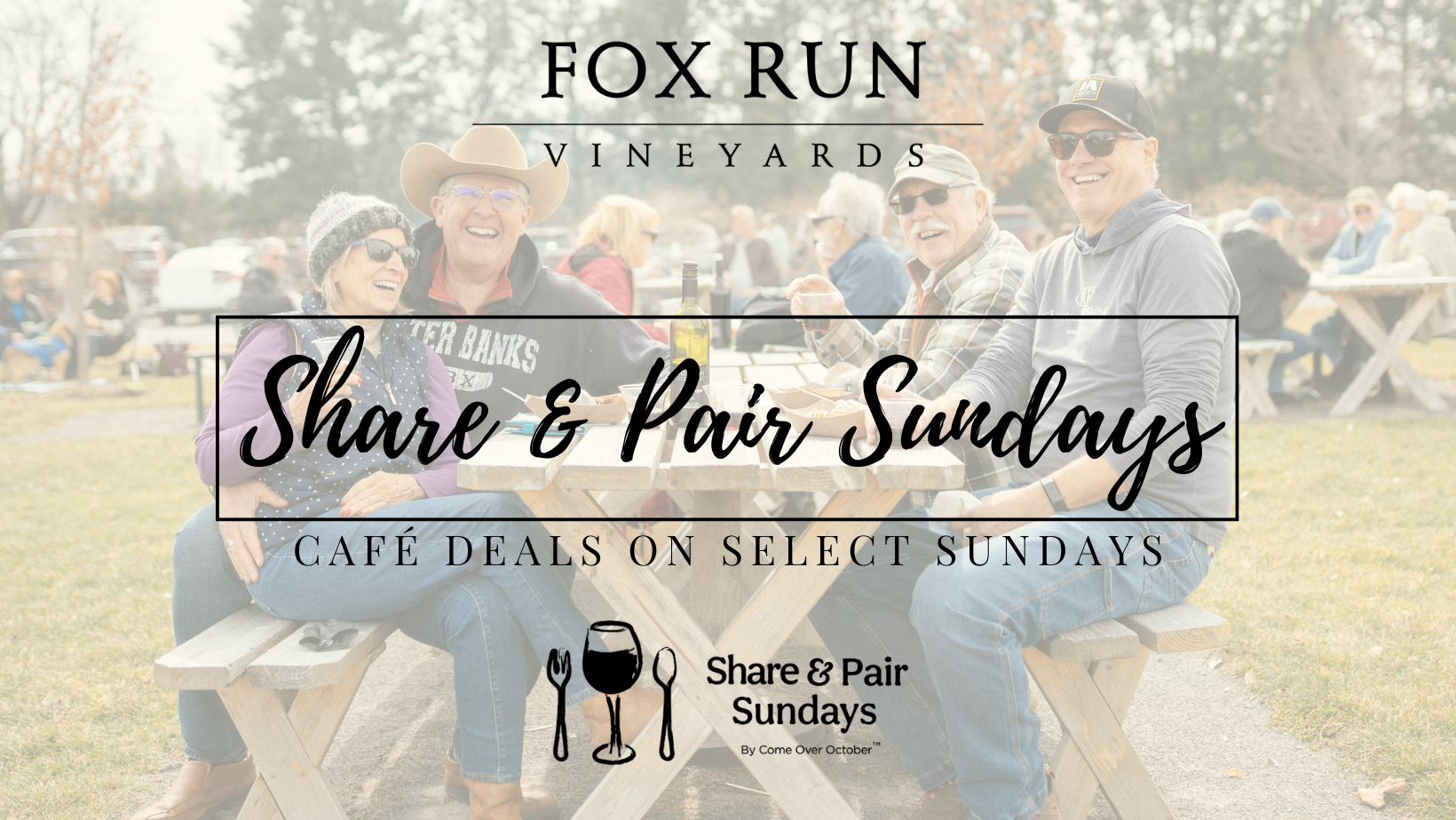 people sitting at a table smiling and laughing