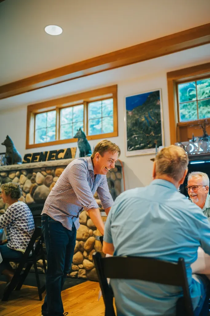 wine club guests seated at a table