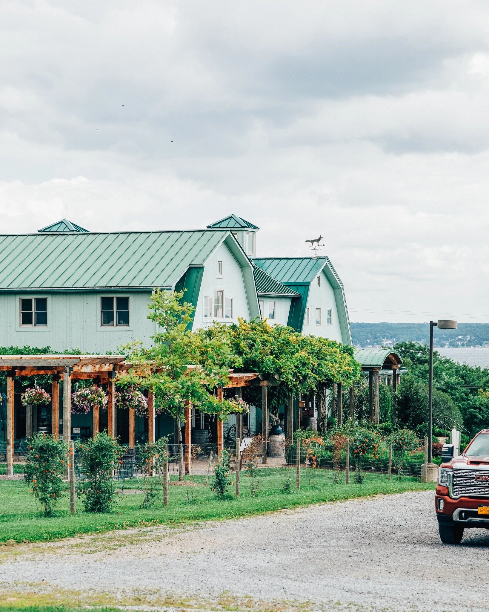 Fox Run Winery & tasting room with Seneca Lake in background