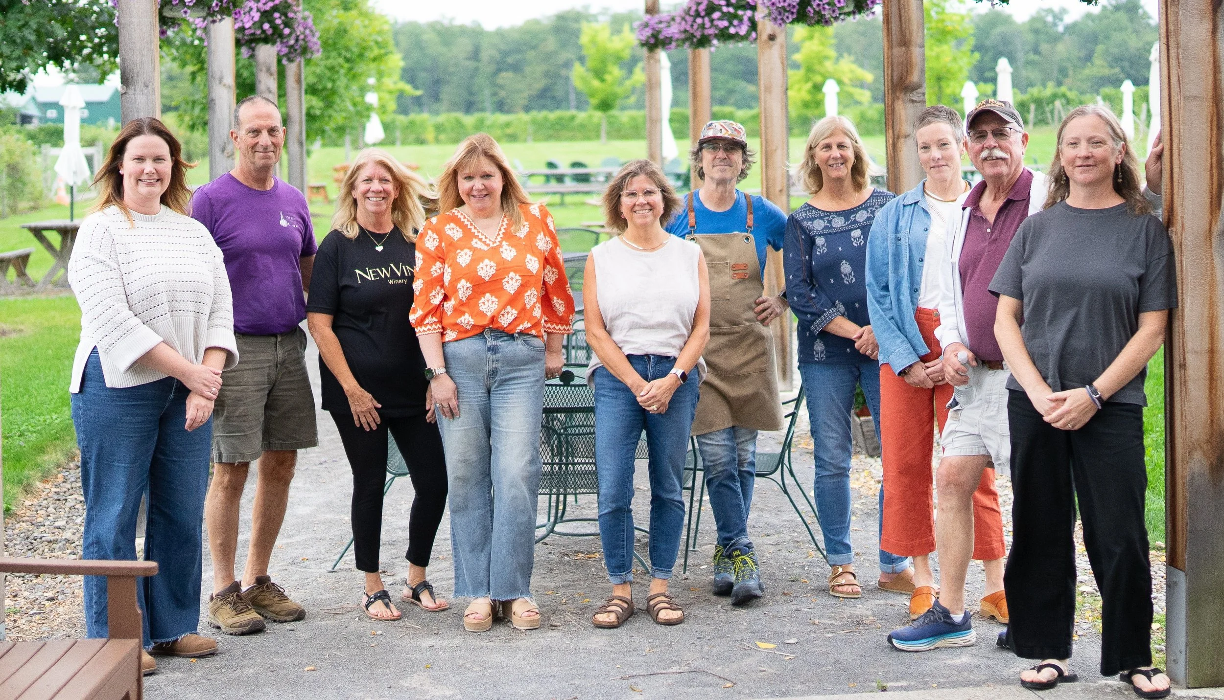 A group of winery owners standing together