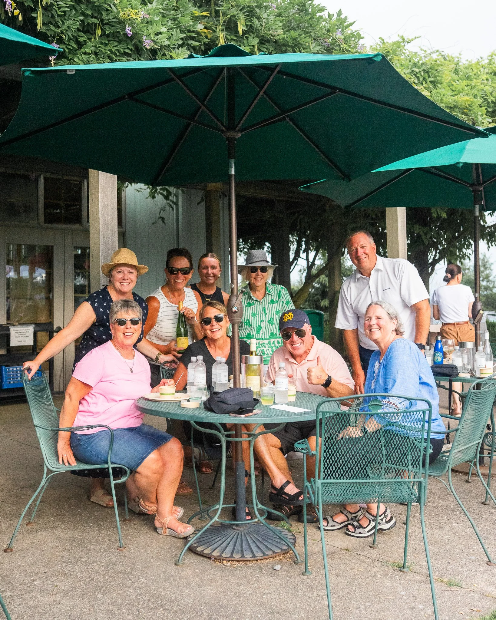 people sitting at a table smiling