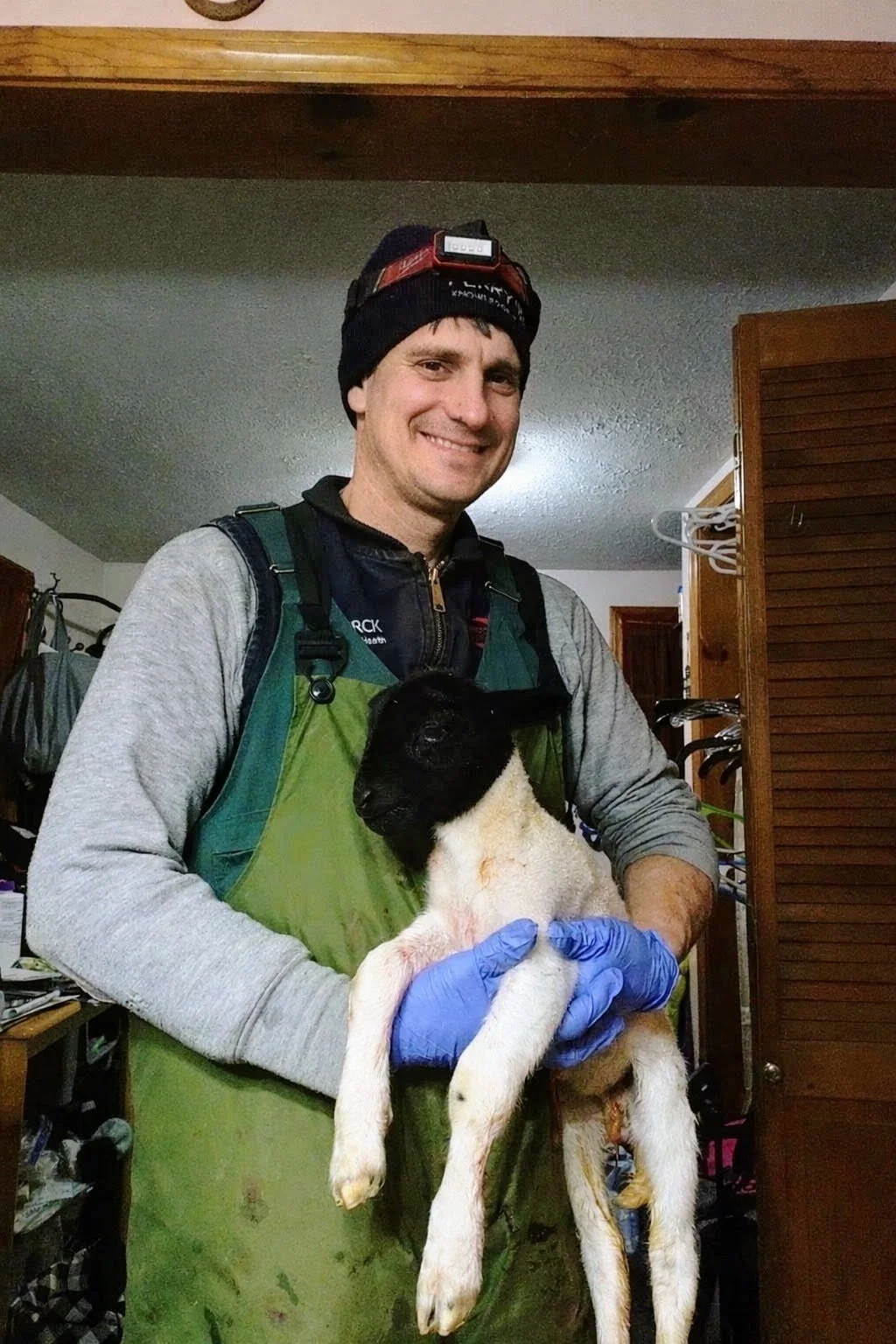 PVet holding goat