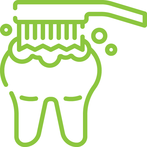 Tooth being cleaned with dental tool and water splash.
