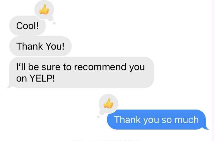 A screenshot of a text message conversation with emojis of a thumbs up and a blue response bubble.