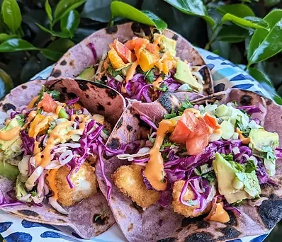 Crispy Halibut Tacos with Spicy Habanero Avocado Crema Cabbage Slaw
