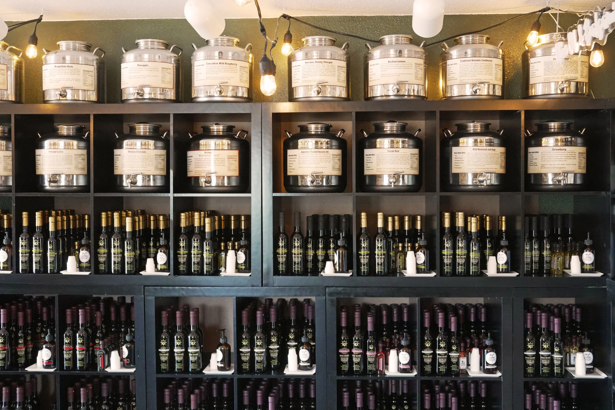 Fog Horn Tasting Room olive oil and balsamic bottles on display