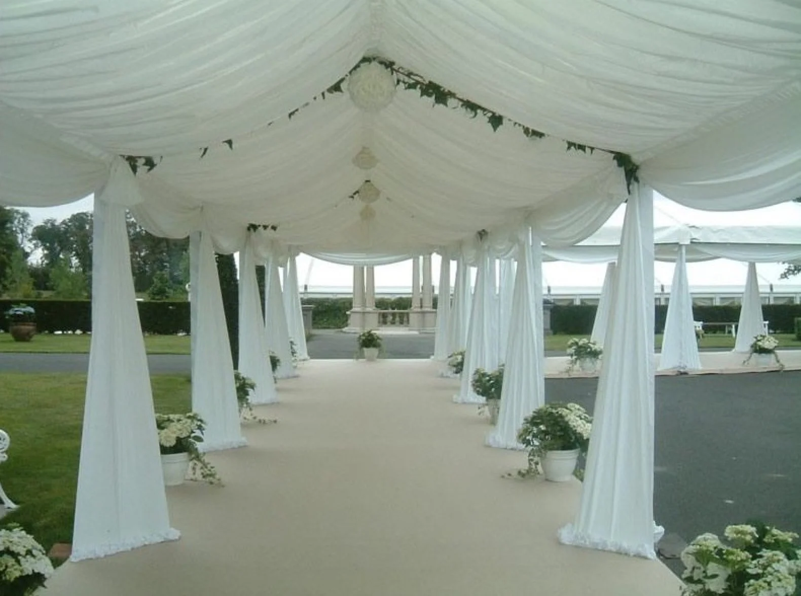 White Wedding marquee walkway with draping for weddings