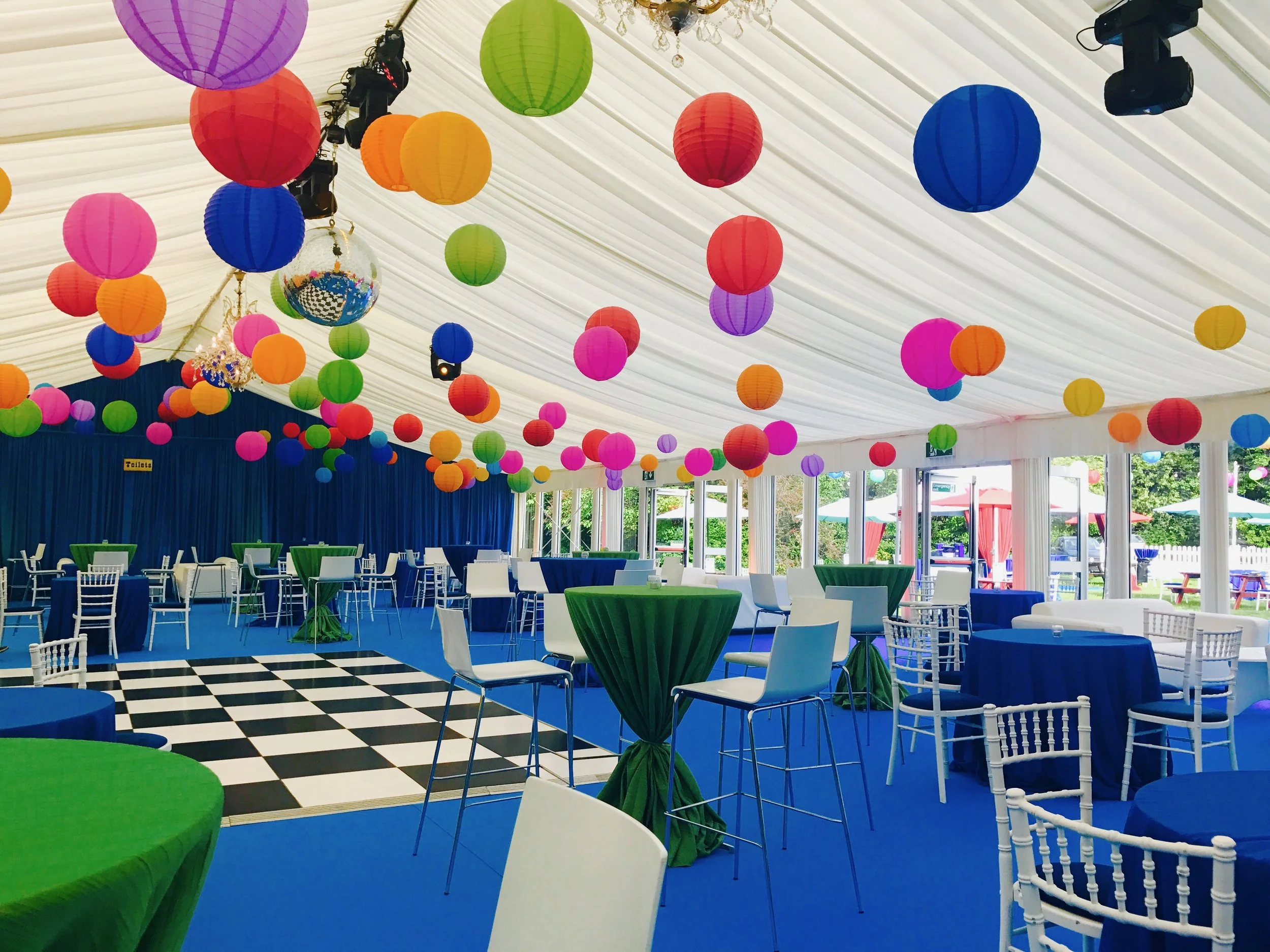 Party event decor with drapes and lanterns 