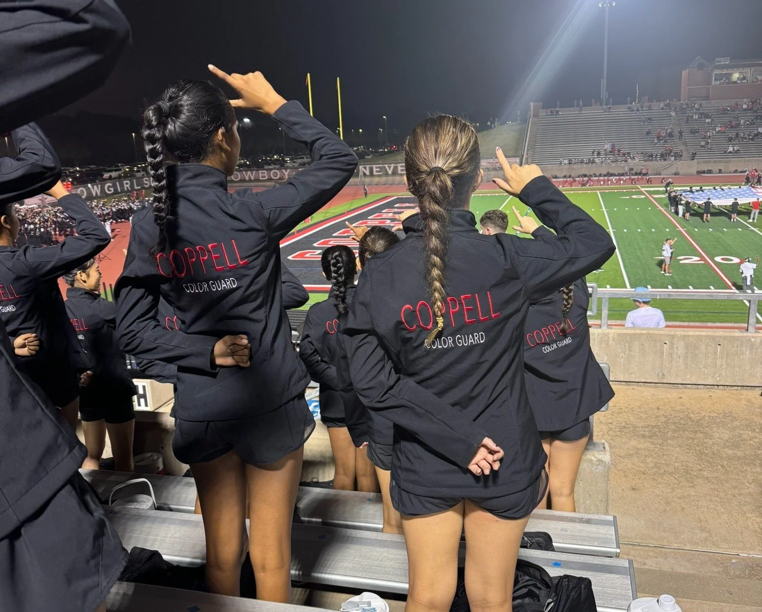 Windham daughter participating in Color Guard for Coppell High School band.