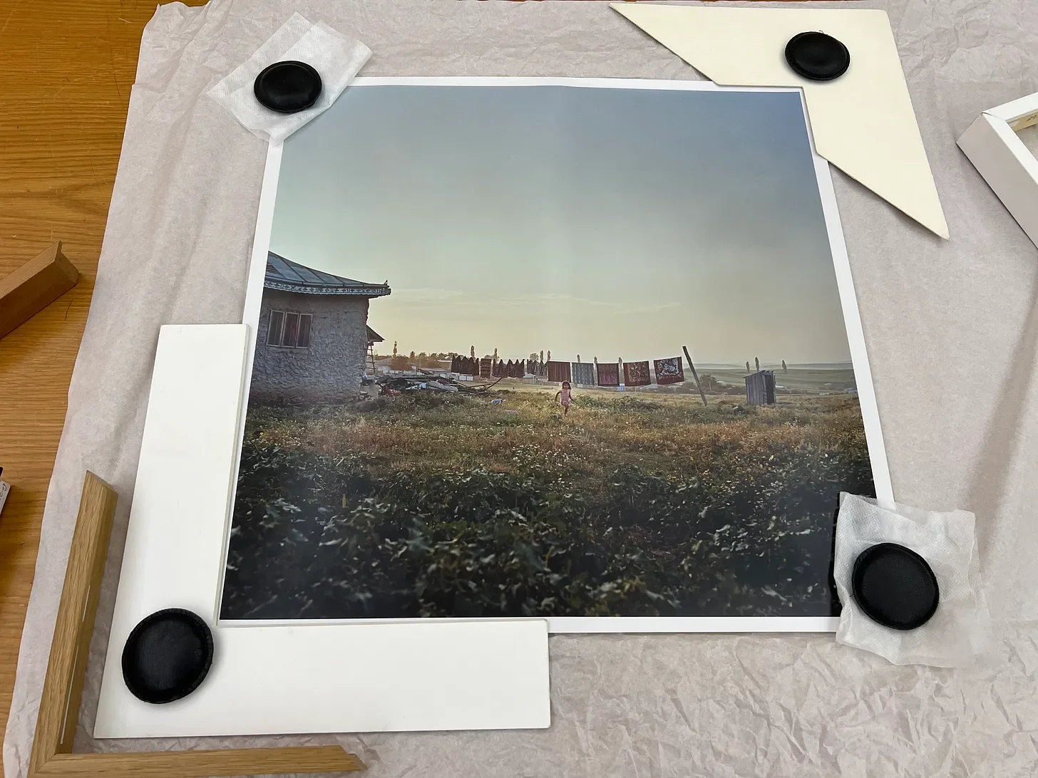 A print by Laura Pannack being framed