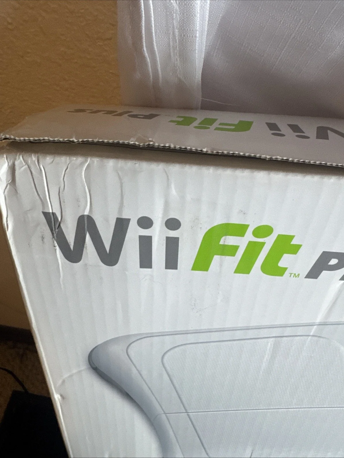 The Wii Fit Plus Bundle includes the Nintendo Wii console, along with the game "Wii Fit Plus" published by Nintendo Games.
