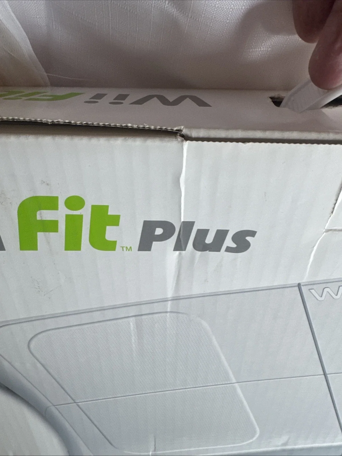 The Wii Fit Plus Bundle includes the Nintendo Wii console, along with the game "Wii Fit Plus" published by Nintendo Games.