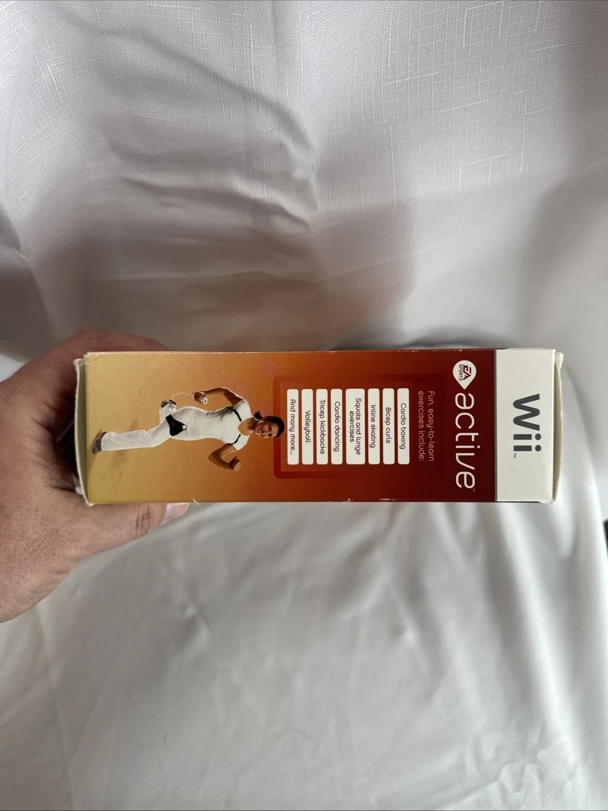 The product is a new open box copy of EA Sports Active for the Nintendo Wii console. Published by Electronic Arts, this game falls under the sub-genre of boxing and carries an E-Everyone rating.