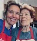 Mother and daughter sharing the love of baking and cooking , through time and generations.