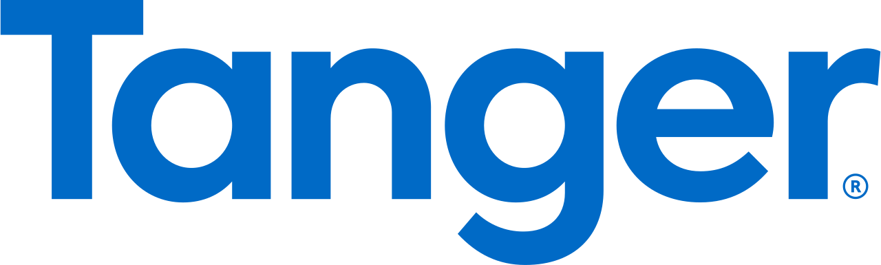 Close-up of the blue and black Logo of Tager with part of the letter 'T' visible